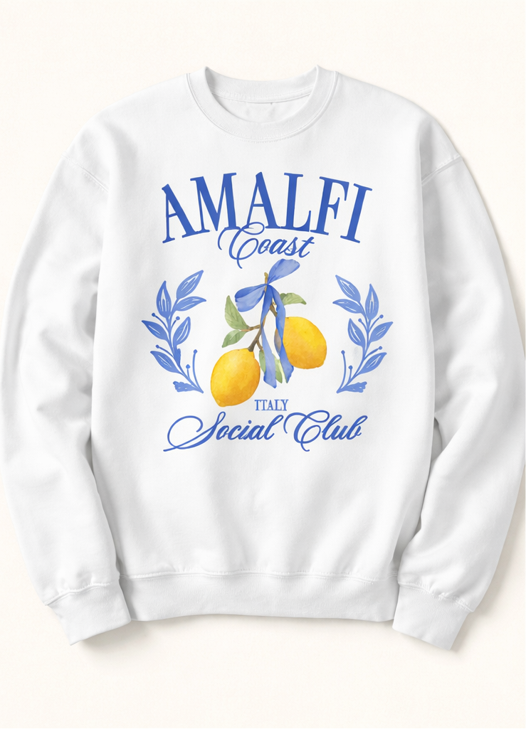 White sweatshirt and beige t-shirt with 'Amalfi Coast Social Club' design featuring lemons and laurel wreaths.